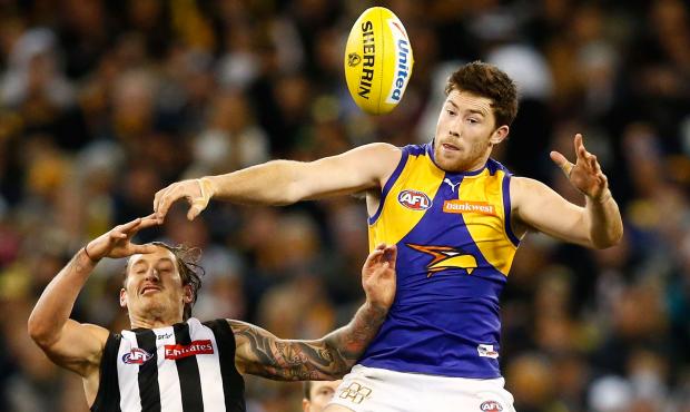 Adelaide, Australia. 03rd June, 2023. Conor Nash of the Hawks is tackled by  Dan Houston and Riley Bonner of the Power during the AFL Round 12 match  between the Port Adelaide Power