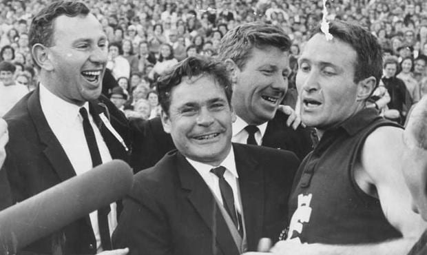Left to right: Graeme Emanuel, Ron Barassi, Graham Donaldson and John Nicholls embrace at the final siren during the 1968 Grand Final.