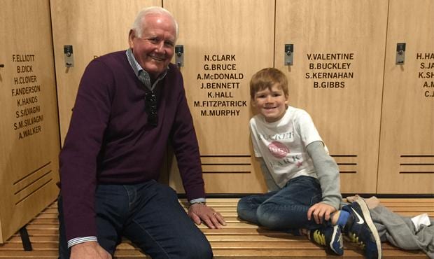 Three-time premiership player Kevin Hall poses in front of the No.3 locker. (Photo: Carlton Football Club)