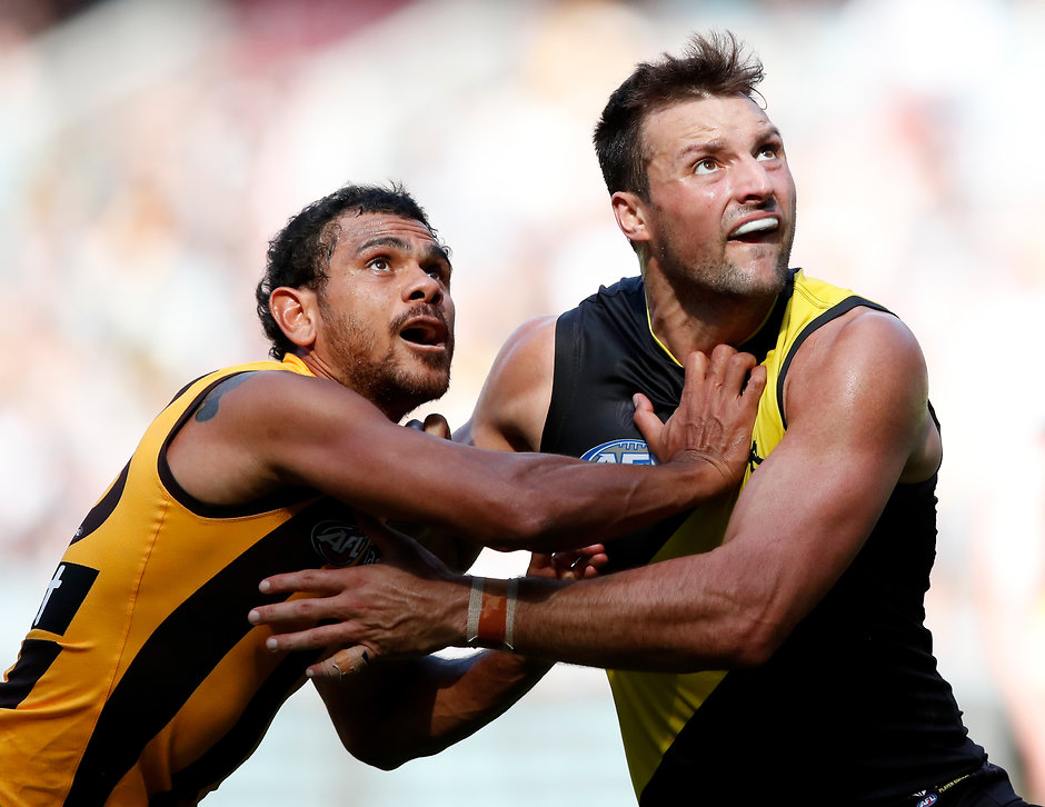An unequal battle in the ruck with Cyril Rioli taking on Toby Nankervis - AFL,Richmond Tigers,Hawthorn Hawks,MCG