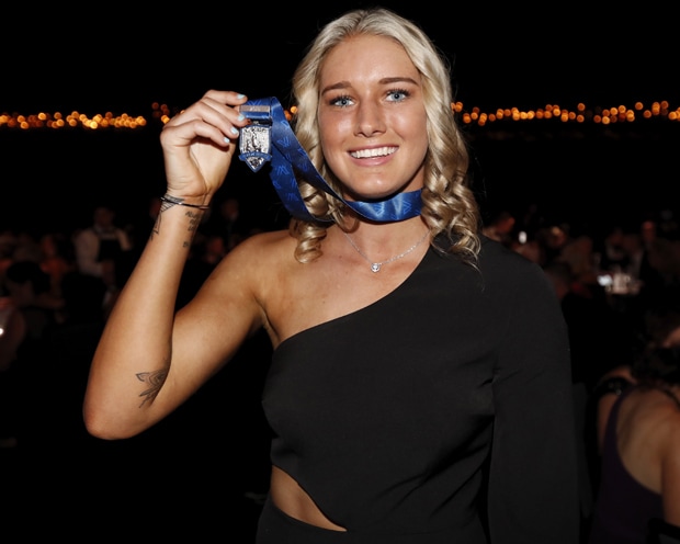 Tayla Harris shows off her Mark of the Year medal at Tuesday night's W...