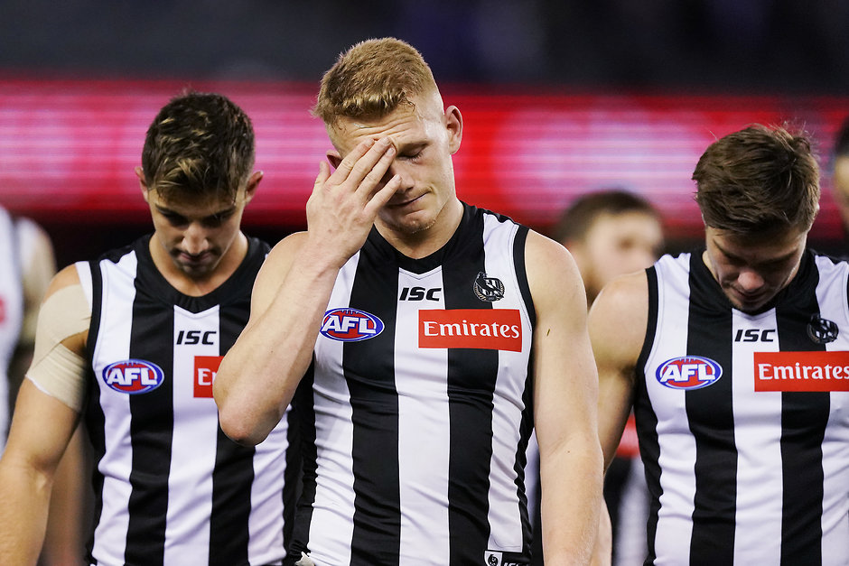 Kennett, McGuire, and Adam Treloar cop 