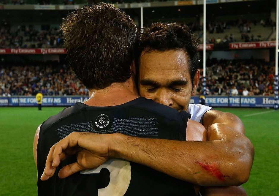 AFL 2014 Rd 10 - Carlton v Adelaide Marc Murphy of the Blues and Eddie Betts of the Crows embrace after the 2014 AFL Round 10 match between Carlton Blues and the Adelaide Crows at Etihad Stadium, Melbourne on May 25, 2014. (Photo: Michael Willson/AFL Media)