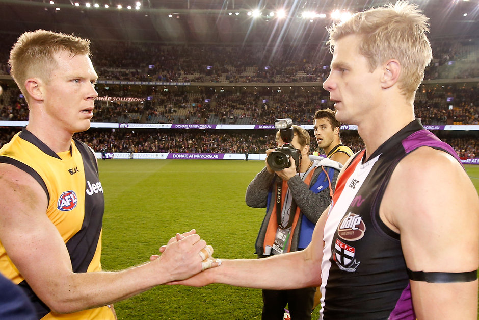 AFL 2015 Rd 16 - St Kilda v Richmond MELBOURNE, AUSTRALIA - JULY 19: Jack Riewoldt of the Tigers and Nick Riewoldt of the Saints shake hands after the 2015 AFL round 16 match between the St Kilda Saints and the Richmond Tigers at Etihad Stadium, Melbourne, Australia on July 19, 2015. (Photo by Darrian Traynor/AFL Media)
