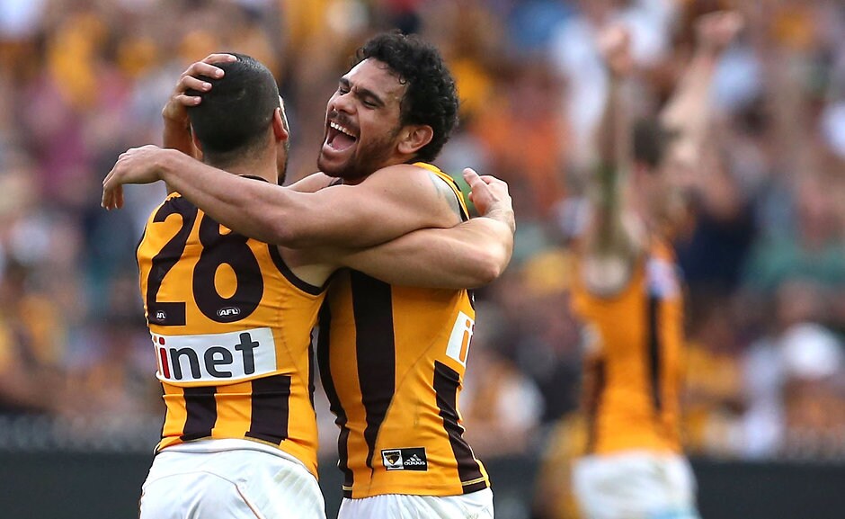 2015 Toyota AFL Grand Final - Hawthorn v West Coast Cyril Rioli embraces Paul Puopolo on the siren of the 2015 Grand Final - AFL,Cyril Rioli,Hawthorn Hawks