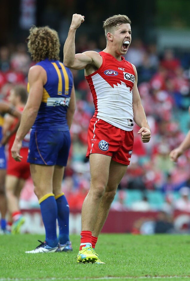 AFL 2016 Rd 05 - Sydney v West Coast SYDNEY, AUSTRALIA - APRIL 23: Jake Lloyd of the Swans celebrates after kicking a goal during the 2016 AFL Round 05 match between the Sydney Swans and the West Coast Eagles at the Sydney Cricket Ground, Sydney on April 23, 2016. (Photo by Craig Golding/AFL Media)