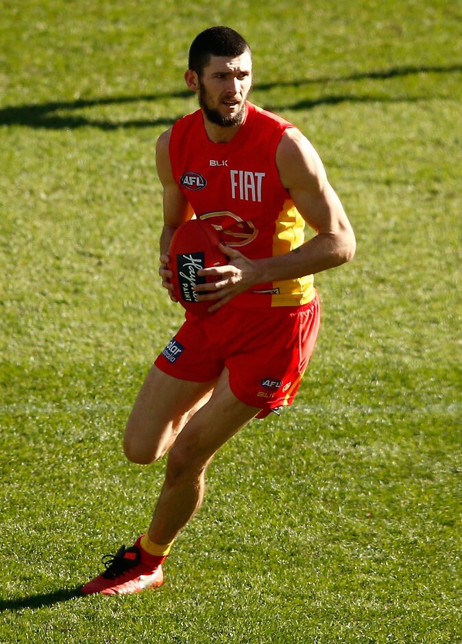 AFL 2016 Rd 19 - Melbourne v Gold Coast MELBOURNE, AUSTRALIA - JULY 31: Jarrad Grant of the Suns in action during the 2016 AFL Round 19 match between the Melbourne Demons and the Gold Coast Suns at the Melbourne Cricket Ground on July 31, 2016 in Melbourne, Australia. (Photo by Adam Trafford/AFL Media)