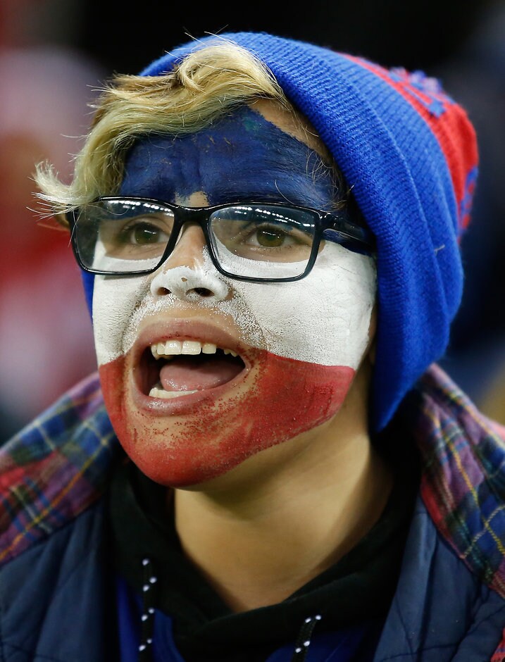 AFL 2016 - EJ Whitten Legends Game MELBOURNE, AUSTRALIA - SEPTEMBER 02: A Western Bulldogs fan cheers during the 2016 EJ Whitten Legends Game between Victoria and the All Stars at Etihad Stadium on September 02, 2016 in Melbourne, Australia. (Photo by Michael Willson/AFL Media)