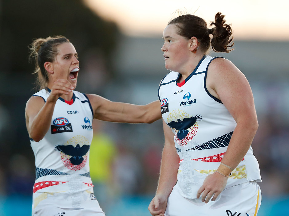 AFLW 2017 Rd 02 - Western Bulldogs v Adelaide MELBOURNE, AUSTRALIA - FEBRUARY 10: Sarah Perkins of the Crows (bottom) celebrates a goal with Chelsea Randall of the Crows during the 2017 AFLW Round 02 match between the Western Bulldogs and the Adelaide Crows at VU Whitten Oval on February 10, 2017 in Melbourne, Australia. (Photo by Adam Trafford/AFL Media)