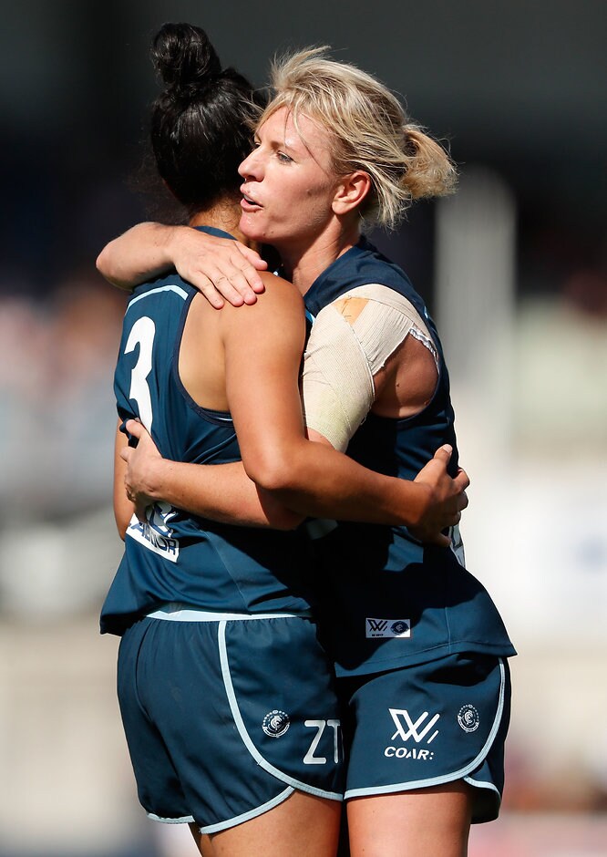 AFLW 2017 Rd 02 - Carlton v GWS Giants MELBOURNE, AUSTRALIA - FEBRUARY 11: Darcy Vescio of the Blues (left) celebrates a goal with Katie Loynes of the Blues during the 2017 AFLW Round 02 match between the Carlton Blues and the GWS Giants at Ikon Park on February 11, 2017 in Melbourne, Australia. (Photo by Adam Trafford/AFL Media)
