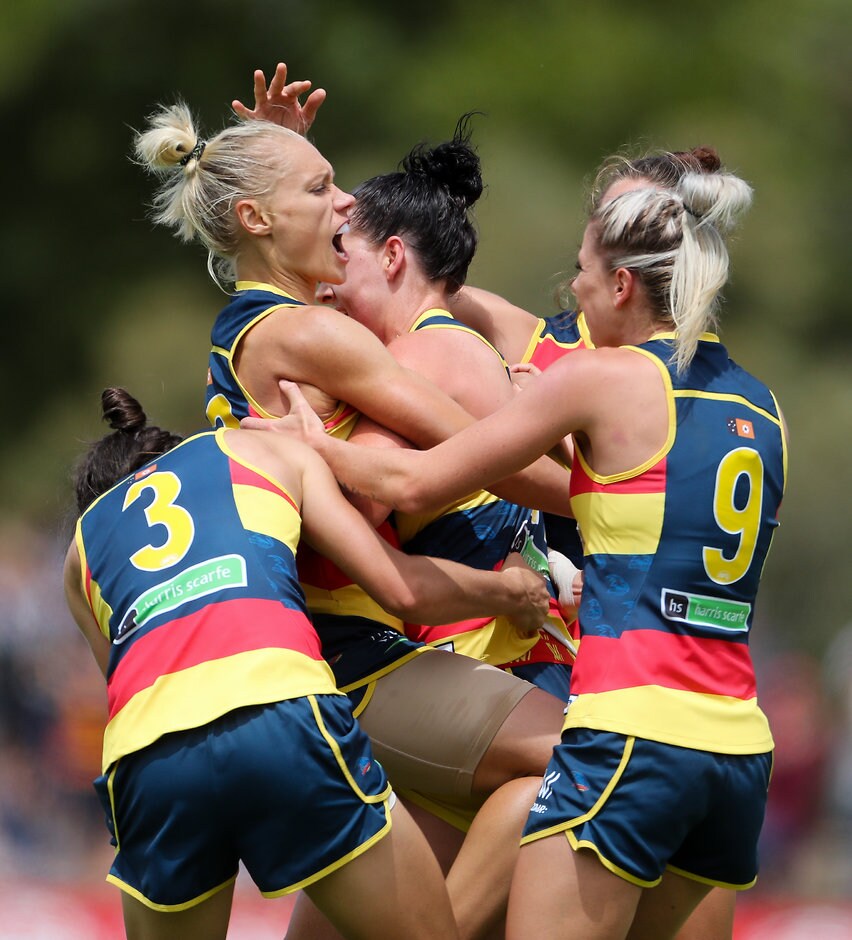 AFLW 2017 Rd 03 - Adelaide v Carlton ADELAIDE, AUSTRALIA - FEBRUARY 19: Erin Phillips of the Crows celebrates a goal with team mates during the 2017 AFLW Round 03 match between the Adelaide Crows and the Carlton Blues at Thebarton Oval on February 19, 2017 in Adelaide, Australia. (Photo by AFL Media)