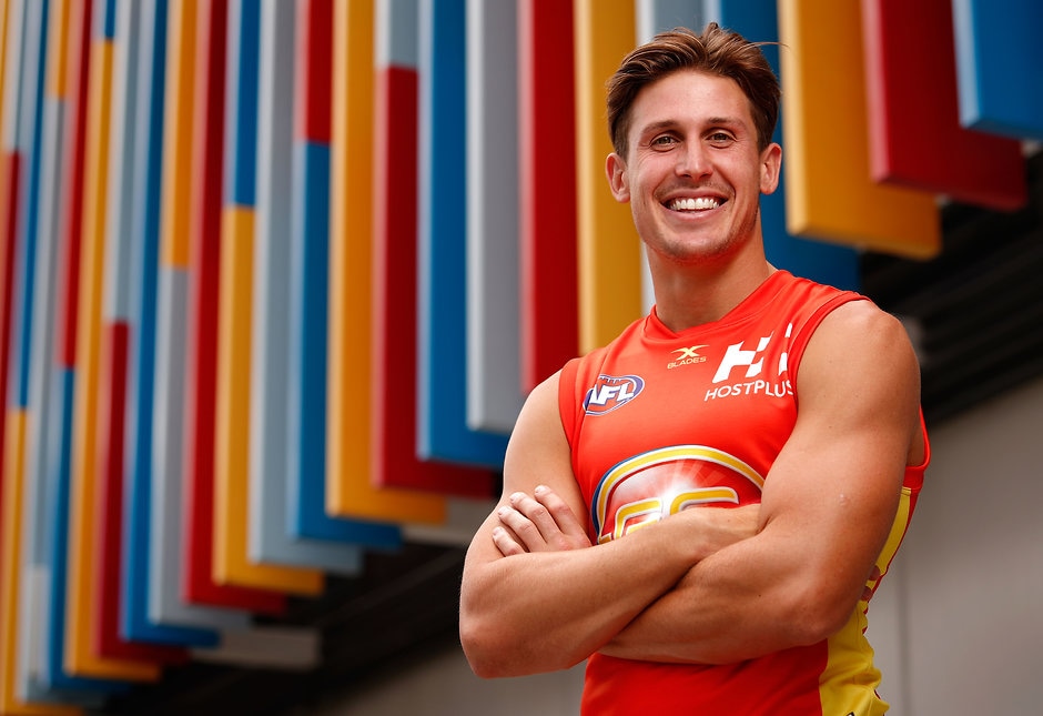 AFL 2017 Portraits - Gold Coast Suns GOLD COAST, AUSTRALIA - FEBRUARY 23: David Swallow of the Suns poses for a portrait during the Gold Coast Suns team photo day at Metricon Stadium on February 23, 2017 in Gold Coast, Australia. (Photo by Adam Trafford/AFL Media)