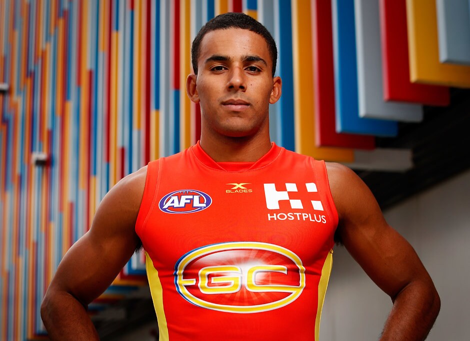 AFL 2017 Portraits - Gold Coast Suns GOLD COAST, AUSTRALIA - FEBRUARY 23: Touk Miller of the Suns poses for a portrait during the Gold Coast Suns team photo day at Metricon Stadium on February 23, 2017 in Gold Coast, Australia. (Photo by Adam Trafford/AFL Media)