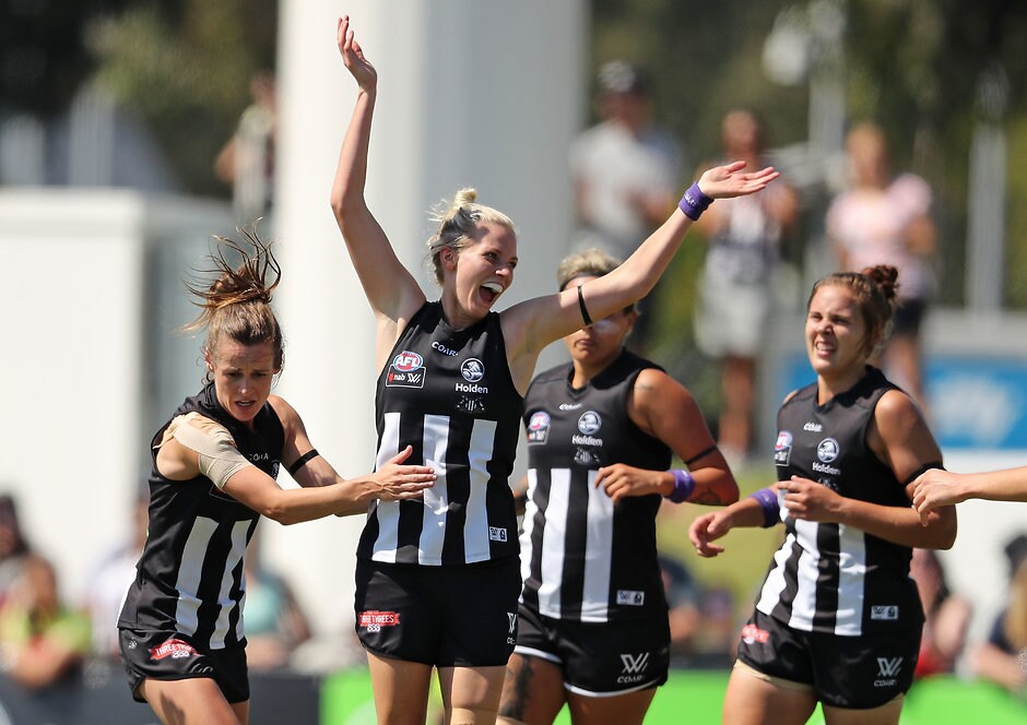 AFLW 2017 Rd 06 - Collingwood v GWS Giants MELBOURNE, AUSTRALIA - MARCH 12: Christina Bernardi of the Magpies is congratulated by her teammates after kicking a goal during the round six AFL Women's match between the Collingwood Magpies and the Greater Western Sydney Giants at Olympic Park on March 12, 2017 in Melbourne, Australia. (Photo by Scott Barbour/Getty Images)