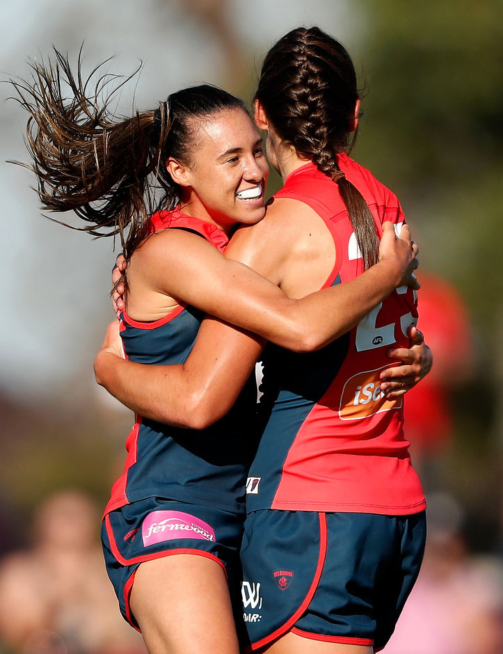 AFLW 2017 Rd 07 - Melbourne v Fremantle MELBOURNE, AUSTRALIA - MARCH 18: Aliesha Newman of the Demons (left) celebrates a goal with Madeleine Boyd of the Demons during the 2017 AFLW Round 07 match between the Melbourne Demons and the Fremantle Dockers at Casey Fields on March 18, 2017 in Melbourne, Australia. (Photo by Adam Trafford/AFL Media)