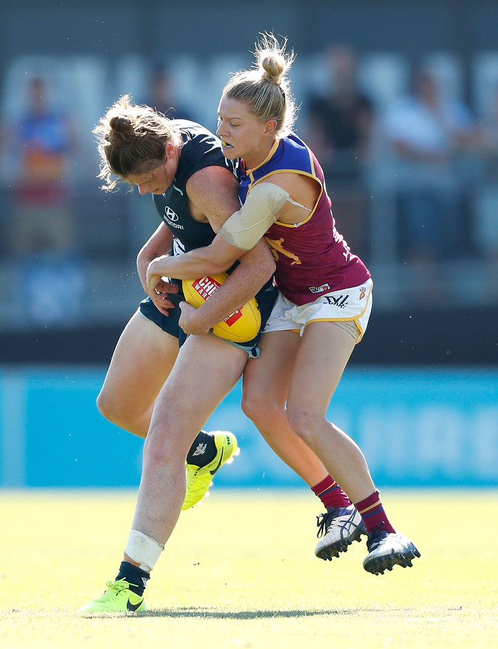 AFLW 2017 Rd 07 - Carlton v Brisbane MELBOURNE, AUSTRALIA - MARCH 19: Brianna Davey of the Blues is tackled by Kate McCarthy of the Lions during the 2017 AFLW Round 07 match between the Carlton Blues and the Brisbane Lions at Ikon Park on March 19, 2017 in Melbourne, Australia. (Photo by Adam Trafford/AFL Media)