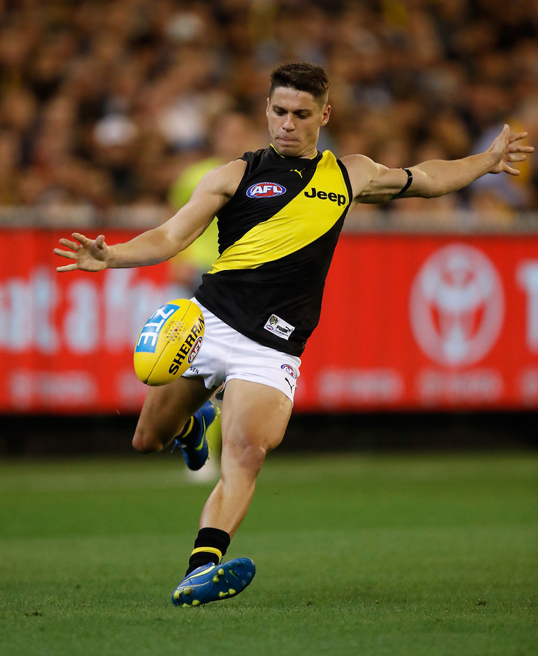 AFL 2017 Round 01 - Carlton v Richmond MELBOURNE, AUSTRALIA - MARCH 23: Dion Prestia of the Tigers kicks the ball during the 2017 AFL round 01 match between the Carlton Blues and the Richmond Tigers at the Melbourne Cricket Ground on March 23, 2017 in Melbourne, Australia. (Photo by Michael Willson/AFL Media)