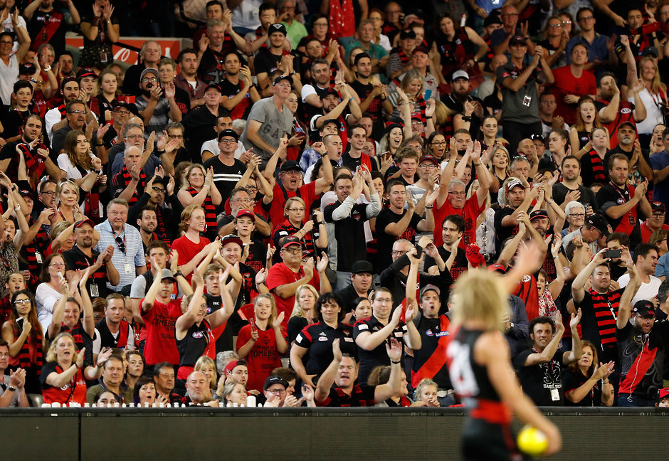 AFL 2017 Round 01 - Essendon v Hawthorn MELBOURNE, AUSTRALIA - MARCH 25: Bombers fans cheer as new captain Dyson Heppell of the Bombers takes possession of the ball before the siren during the 2017 AFL round 01 match between the Essendon Bombers and the Hawthorn Hawks at the Melbourne Cricket Ground on March 25, 2017 in Melbourne, Australia. (Photo by Adam Trafford/AFL Media)