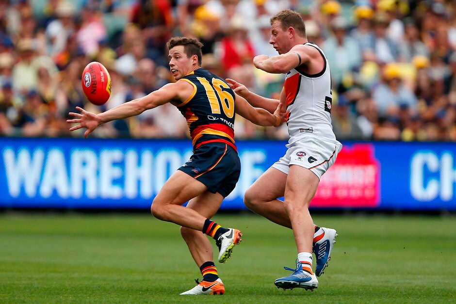AFL 2017 Round 01 - Adelaide v GWS Giants ADELAIDE, AUSTRALIA - MARCH 26: Luke Brown of the Crows is tackled by Steve Johnson of the Giants during the 2017 AFL round 01 match between the Adelaide Crows and the GWS Giants at Adelaide Oval on March 26, 2017 in Adelaide, Australia. (Photo by James Elsby/AFL Media)