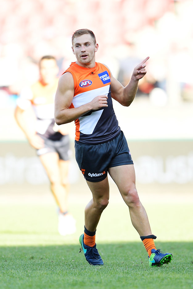 AFL 2016 Rd 02 - GWS v Gold Coast Suns SYDNEY, AUSTRALIA - APRIL 01: Devon Smith of the Giants celebrates kicking a goal during the round two AFL match between the Greater Western Sydney Giants and the Gold Coast Suns at Spotless Stadium on April 1, 2017 in Sydney, Australia. (Photo by Brett Hemmings/AFL Media/Getty Images)