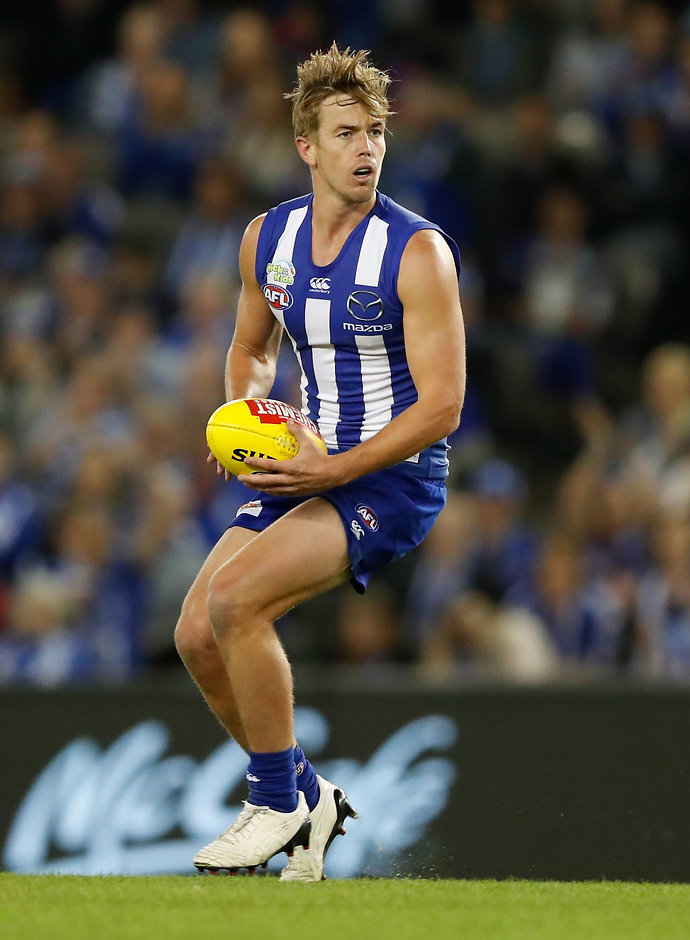 AFL 2017 Round 04 - North Melbourne v Western Bulldogs MELBOURNE, AUSTRALIA - APRIL 14: Trent Dumont of the Kangaroos in action during the 2017 AFL round 04 match between the North Melbourne Kangaroos and the Western Bulldogs at Etihad Stadium on April 14, 2017 in Melbourne, Australia. (Photo by Adam Trafford/AFL Media)