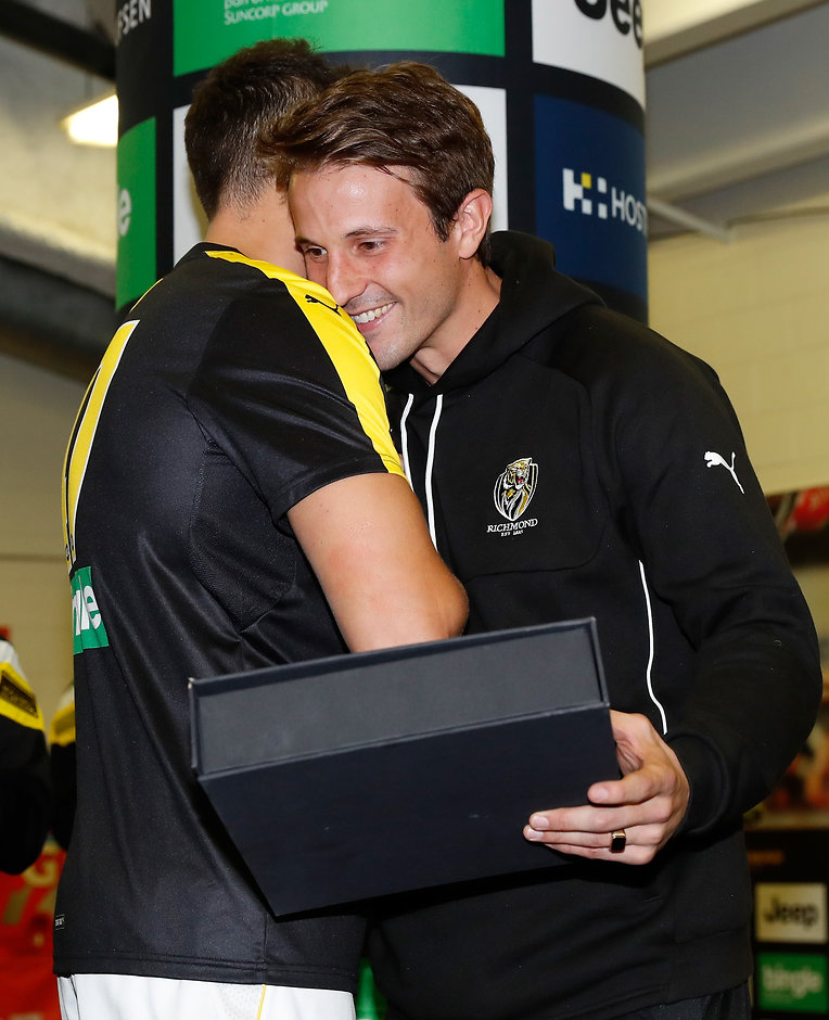 AFL 2017 Round 07 - Western Bulldogs v Richmond MELBOURNE, AUSTRALIA - MAY 06: Debutant, Ivan Soldo (left) is presented with his jumper by cousin Ivan Maric of the Tigers during the 2017 AFL round 07 match between the Western Bulldogs and the Richmond Tigers at Etihad Stadium on May 06, 2017 in Melbourne, Australia. (Photo by Michael Willson/AFL Media)