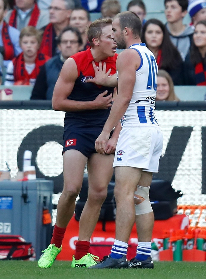 AFL 2017 Round 09 - Melbourne v North Melbourne MELBOURNE, AUSTRALIA - MAY 21: Ben Cunnington of the Kangaroos and Bernie Vince of the Demons clash during the 2017 AFL round 09 match between the Melbourne Demons and the North Melbourne Kangaroos at the Melbourne Cricket Ground on May 21, 2017 in Melbourne, Australia. (Photo by Michael Willson/AFL Media)