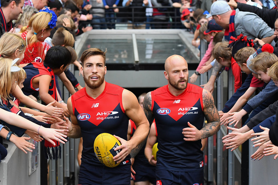 AFL 2017 Round 09 - Melbourne v North Melbourne MELBOURNE, AUSTRALIA - MAY 21: Jack Viney and Nathan Jones of the Demons lead their team out for warm up during the round nine AFL match between the Melbourne Demons and the North Melbourne Kangaroos at Melbourne Cricket Ground on May 21, 2017 in Melbourne, Australia. (Photo by Quinn Rooney/Getty Images/AFL Media)