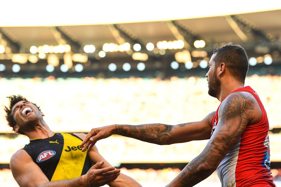 AFL 2017 Round 13 - Richmond v Sydney MELBOURNE, AUSTRALIA - JUNE 17: Alex Rance of the Tigers is pushed by Lance Franklin of the Swans during the 2017 AFL round 13 match between the Richmond Tigers and the Sydney Swans at the Melbourne Cricket Ground on June 17, 2017 in Melbourne, Australia. (Photo by Daniel Carson/AFL Media)