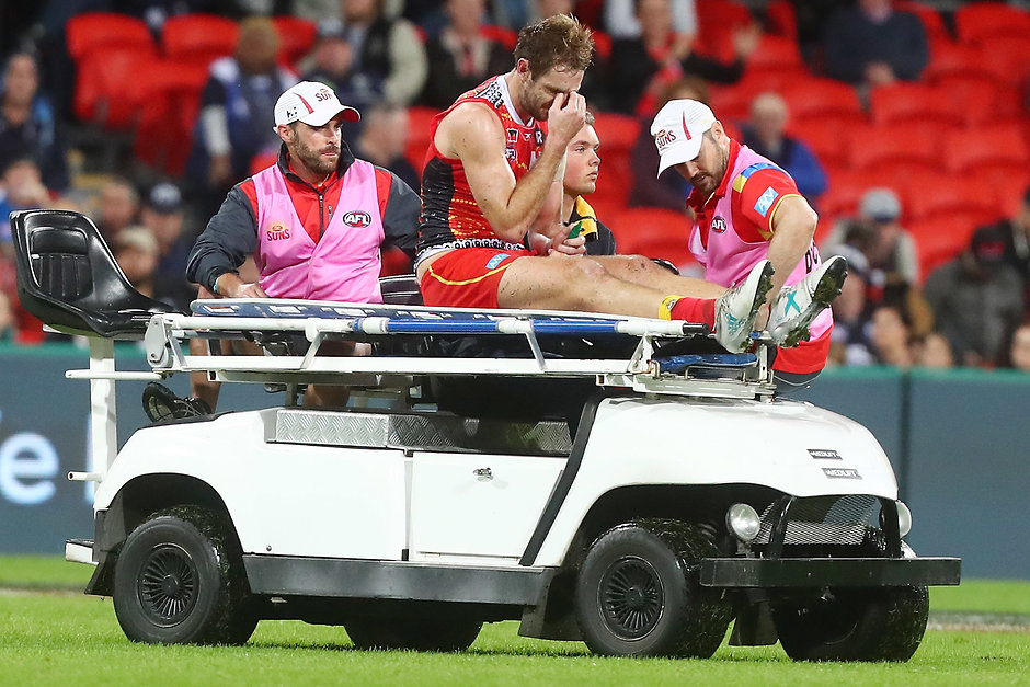 AFL 2017 Round 13 - Gold Coast v Carlton Michael Barlow is carried off after breaking his leg against Carlton in round 13 last year - AFL,Gold Coast Suns,Michael Barlow