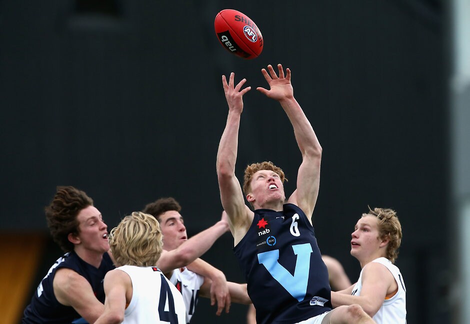 AFL 2017 U16 Championship - Vic Metro v Vic Country MELBOURNE, AUSTRALIA - JUNE 24: Matthew Rowell of Vic Metro marks during the 2017 AFL Under 16 Championship match between Vic Metro and Vic Country at Punt Road Oval on June 24, 2017 in Melbourne, Australia. (Photo by Rob Prezioso/AFL Media)