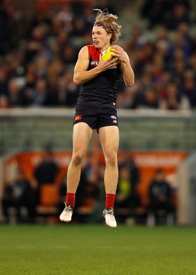 AFL 2017 Round 15 - Melbourne v Sydney MELBOURNE, AUSTRALIA - JUNE 30: Jayden Hunt of the Demons marks the ball during the 2017 AFL round 15 match between the Melbourne Demons and the Sydney Swans at the Melbourne Cricket Ground on June 30, 2017 in Melbourne, Australia. (Photo by Michael Willson/AFL Media)