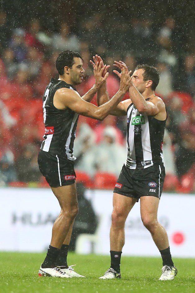 AFL 2017 Round 17 - Gold Coast v Collingwood GOLD COAST, AUSTRALIA - JULY 15: Daniel Wells of the Magpies celebrates a goal during the round 17 AFL match between the Gold Coast Suns and the Collingwood Magpies at Metricon Stadium on July 15, 2017 in Gold Coast, Australia. (Photo by Chris Hyde/Getty Images/AFL Media)