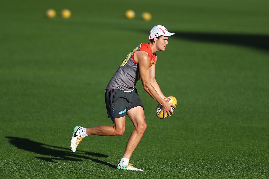AFL 2017 Training - Gold Coast 150817 GOLD COAST, AUSTRALIA - AUGUST 15: Jack Bowes kicks during a Gold Coast Suns AFL training session at Metricon Stadium on August 15, 2017 in Gold Coast, Australia. (Photo by Chris Hyde/Getty Images/AFL Media)