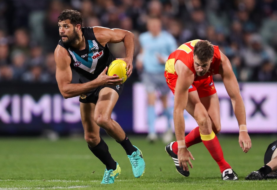 AFL 2017 Round 23 - Port Adelaide v Gold Coast ADELAIDE, AUSTRALIA - AUGUST 26: Paddy Ryder of the Power breaks away from Keegan Brooksby of the Suns during the 2017 AFL round 23 match between the Port Adelaide Power and the Gold Coast Suns at Adelaide Oval on August 26, 2017 in Adelaide, Australia. (Photo by AFL Media)