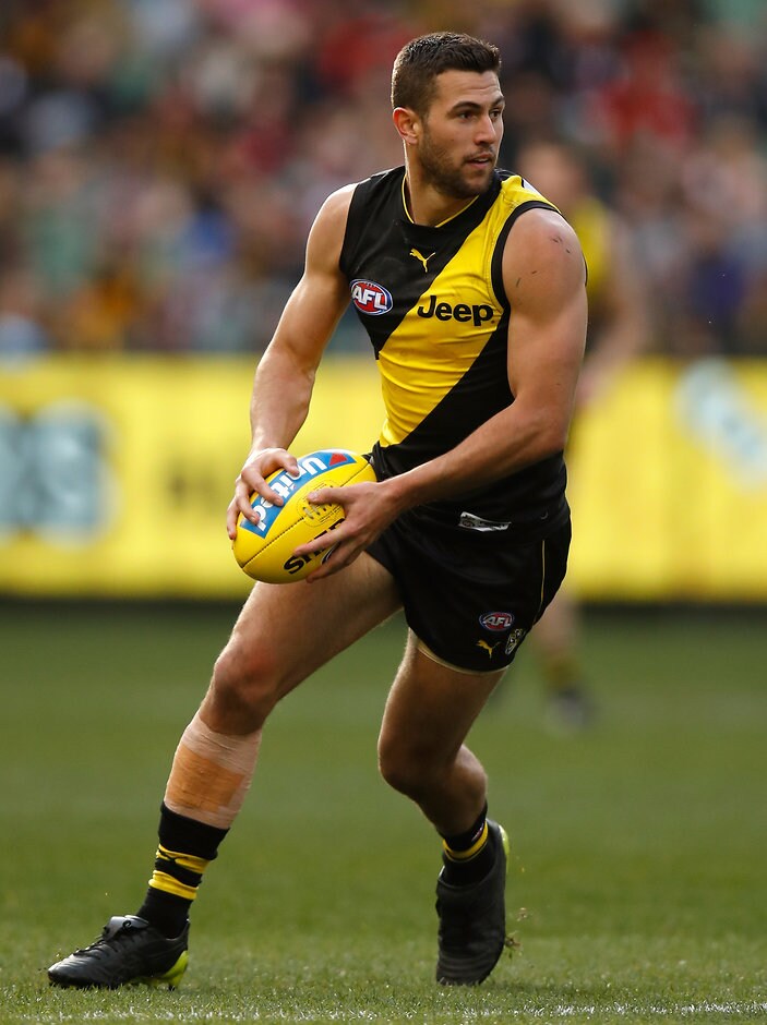 AFL 2017 Round 23 - Richmond v St Kilda MELBOURNE, AUSTRALIA - AUGUST 27: Jack Graham of the Tigers in action during the 2017 AFL round 23 match between the Richmond Tigers and the St Kilda Saints at the Melbourne Cricket Ground on August 27, 2017 in Melbourne, Australia. (Photo by Michael Willson/AFL Media)