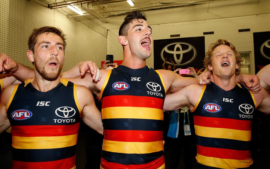AFL 2017 First Preliminary Final - Adelaide v Geelong ADELAIDE, AUSTRALIA - SEPTEMBER 22: (L-R) Richard Douglas, Taylor Walker and Rory Sloane of the Crows sing the team song during the 2017 AFL First Preliminary Final match between the Adelaide Crows and the Geelong Cats at Adelaide Oval on September 22, 2017 in Adelaide, Australia. (Photo by Adam Trafford/AFL Media)