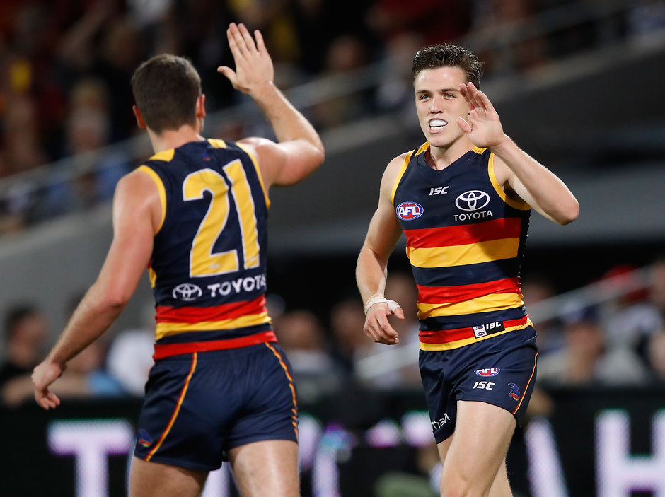AFL 2017 First Preliminary Final - Adelaide v Geelong ADELAIDE, AUSTRALIA - SEPTEMBER 22: Paul Seedsman of the Crows (right) celebrates a goal with Rory Atkins of the Crows during the 2017 AFL First Preliminary Final match between the Adelaide Crows and the Geelong Cats at Adelaide Oval on September 22, 2017 in Adelaide, Australia. (Photo by Adam Trafford/AFL Media)