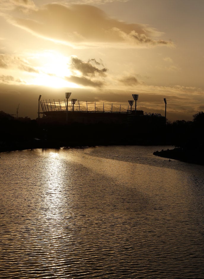 AFL 2017 Toyota AFL Grand Final - Adelaide v Richmond MELBOURNE, AUSTRALIA - SEPTEMBER 30: The sun rises over the MCG before the 2017 Toyota AFL Grand Final match between the Adelaide Crows and the Richmond Tigers at the Melbourne Cricket Ground on September 30, 2017 in Melbourne, Australia. (Photo by Michael Willson/AFL Media)