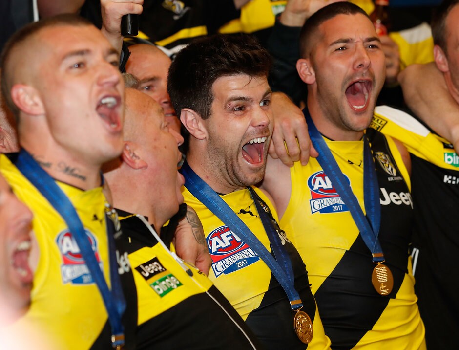 AFL 2017 Toyota AFL Grand Final - Adelaide v Richmond MELBOURNE, AUSTRALIA - SEPTEMBER 30: Trent Cotchin of the Tigers sings the team song during the 2017 Toyota AFL Grand Final match between the Adelaide Crows and the Richmond Tigers at the Melbourne Cricket Ground on September 30, 2017 in Melbourne, Australia. (Photo by Michael Willson/AFL Media)