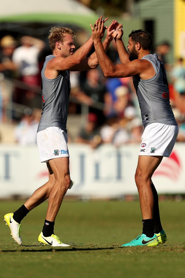 AFL 2018 JLT Community Series - Port Adelaide v Adelaide Crows ADELAIDE, AUSTRALIA - MARCH 10: Jack Watts and Paddy Ryder of the Power celebrate a goal during the AFL 2018 JLT Community Series match between Port Adelaide and the Adelaide Crows at Alberton Oval on March 10, 2018 in Melbourne, Australia. (Photo by James Elsby/AFL Media)
