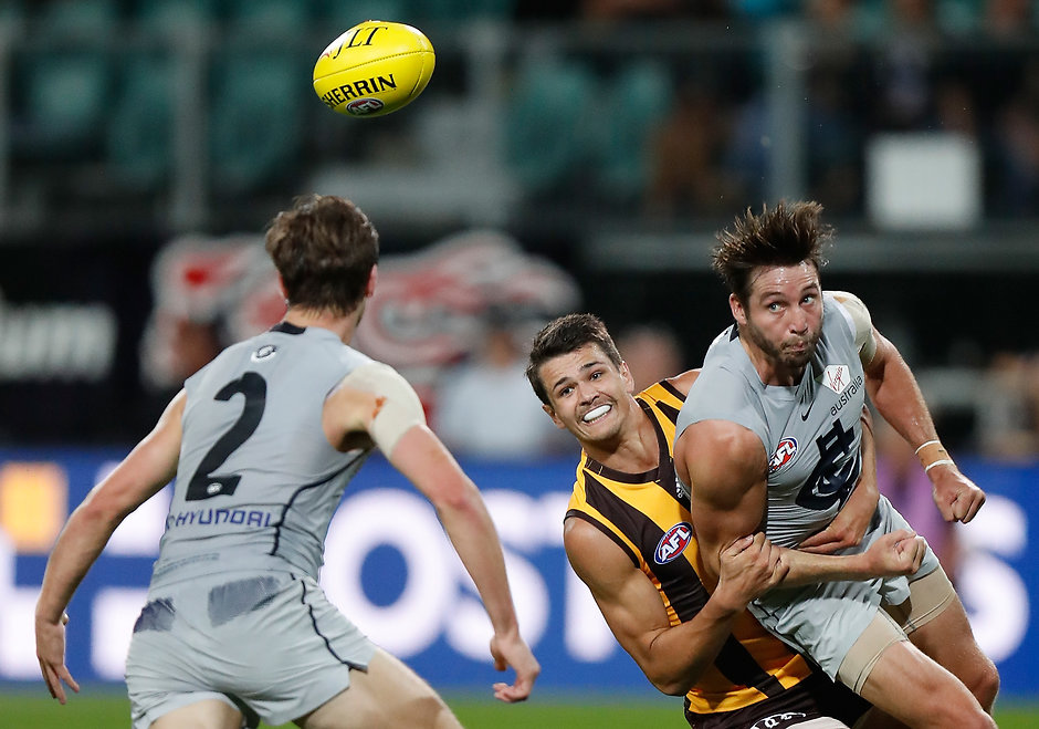 AFL 2018 JLT Community Series - Hawthorn v Carlton LAUNCESTON, AUSTRALIA - MARCH 10: Dale Thomas of the Blues is tackled by Ryan Burton of the Hawks during the AFL 2018 JLT Community Series match between the Hawthorn Haws and the Carlton Blues at UTAS Stadium on March 10, 2018 in Launceston, Australia. (Photo by Michael Willson/AFL Media)