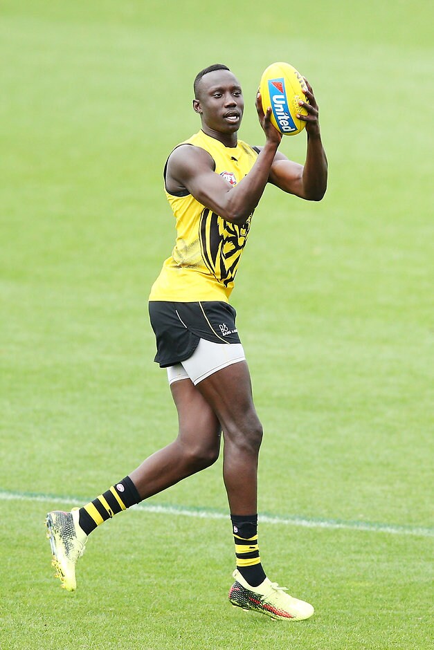 AFL 2018 Training - Richmond 200318 “He’s got that ability to kick goals, which is really important . . . And when he’s got the ball, he can actually take on some smaller guys. He’s got amazing athleticism." Ivan Maric on Mabior Chol - Richmond Tigers,Mabior Chol,Ivan Maric
