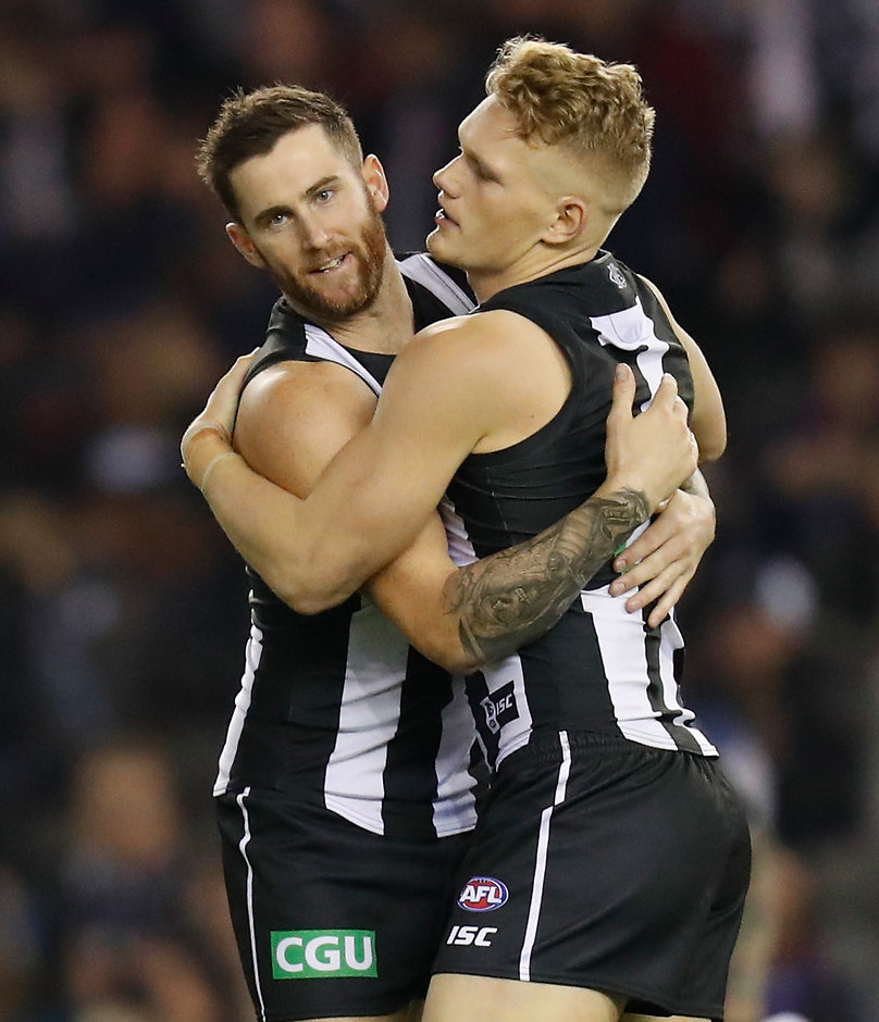 AFL 2018 Round 10 - Collingwood v Western Bulldogs Jeremy Howe and Adam Treloar celebrate a goal - AFL,Collingwood Magpies,Western Bulldogs