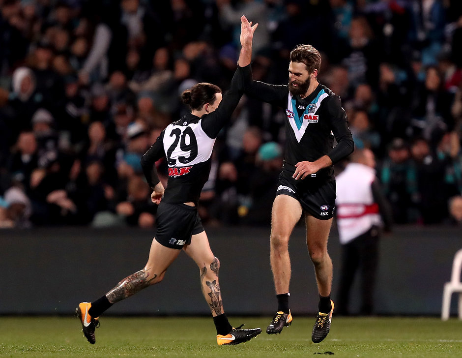 AFL 2018 Round 14 - Port Adelaide v Melbourne ADELAIDE, AUSTRALIA - JUNE 22: Jasper Pittard and Justin Westhoff of the Power celebrate a goal during the 2018 AFL round 14 match between the Port Adelaide Power and the Melbourne Demons at Adelaide Oval on June 22, 2018 in Adelaide, Australia. (Photo by James Elsby/AFL Media)