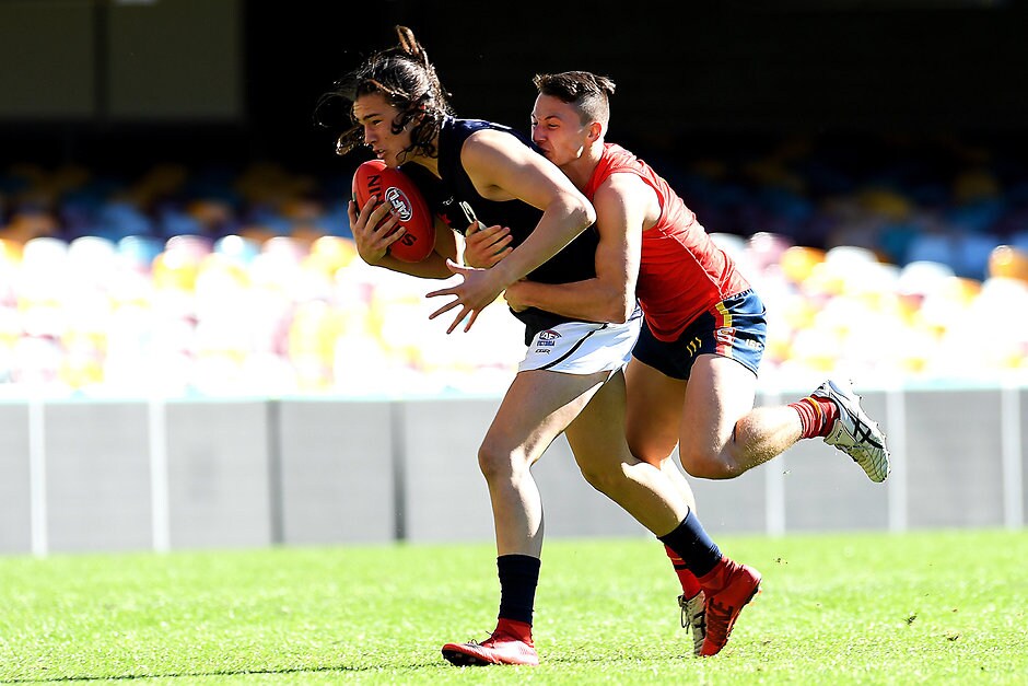 AFL Media Under 16 Championships - Vic M v SA SA's best-on-ground Corey Durdin wraps up Vic Metro's Eddie Ford - AFL,Under-16s