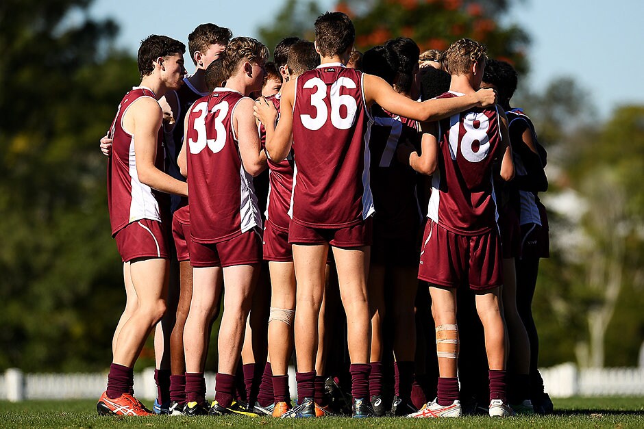 AFL Media Under 16 Championships - Qld v NT BRISBANE, AUSTRALIA - JULY 14: Queensland players in a huddle during the AFL U16 Championships match between Queensland and NT at Yeronga on July 14, 2018 in Brisbane, Australia. (Photo by Albert Perez/AFL Media)
