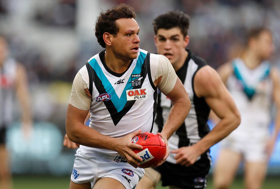 AFL 2018 Round 22 - Collingwood v Port Adelaide MELBOURNE, AUSTRALIA - AUGUST 18: Steven Motlop of the Power in action during the 2018 AFL round 22 match between the Collingwood Magpies and the Port Adelaide Power at the Melbourne Cricket Ground on August 18, 2018 in Melbourne, Australia. (Photo by Michael Willson/AFL Media)