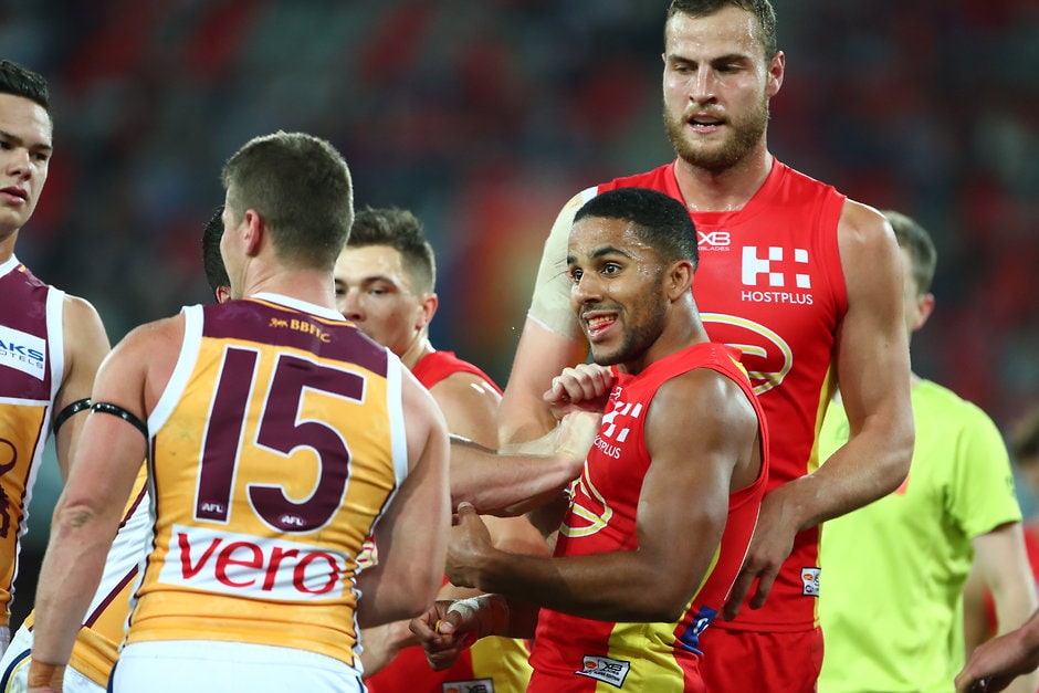 AFL 2018 Round 22 - Gold Coast v Brisbane Touk Miller clashes with Dayne Zorko after last year's round 22 match - AFL,Gold Coast Suns,Brisbane Lions,Dayne Zorko,Touk Miller