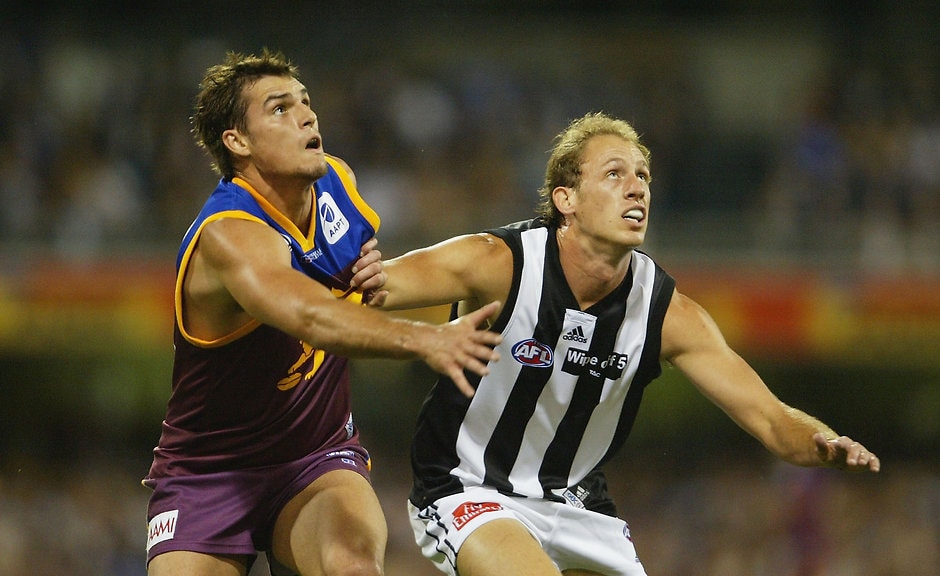 AFL 2004 Rd 3 - Brisbane Lions v Collingwood Jamie Charman and Josh Fraser compete for the ball during the Easter Thursday clash between Collingwood and Brisbane in 2004 - AFL,Fixture,Collingwood Magpies,Collingwood
